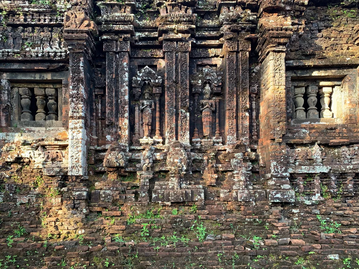 Brick Cham temple towers among the greenery of My Son